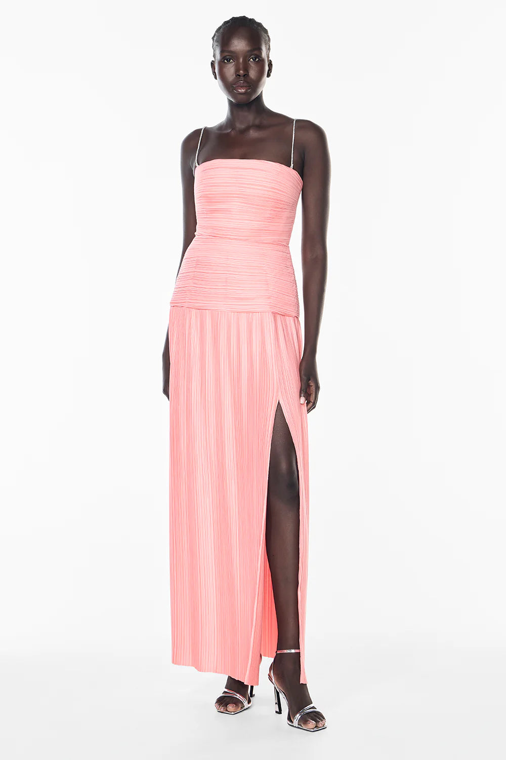 Manning Cartell's Royal Debut Dress Hire in Melon. A pink maxi dress with a corset-style bustier top, featuring a side-leg slit. Perth Try-Ons Available near you.