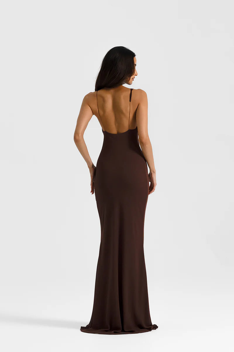 Back image of the Natalie Rolt Hallie Gown in Espresso Brown. A gorgeous, boned-bodice, and asymmetrical neckline that drapes effortlessly into a voluminous maxi-skirt. Available Aus-wide.