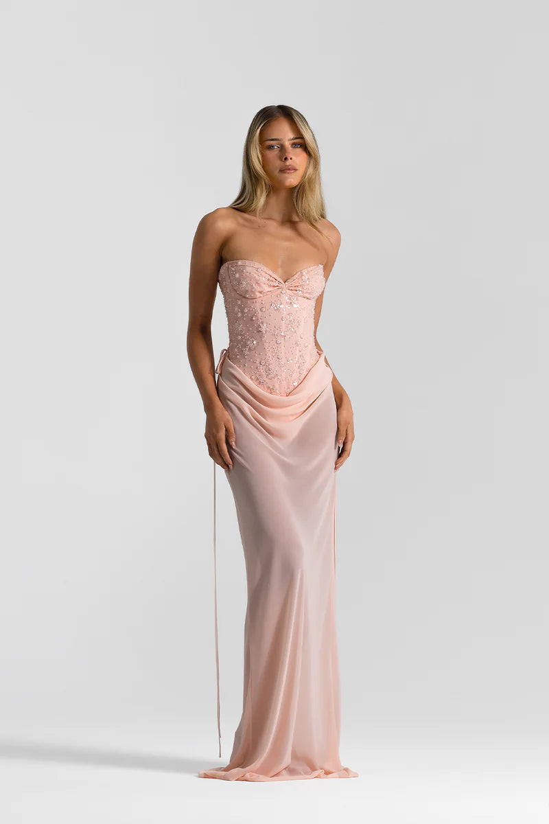 Front view Natalie Rolt, Verity Bustier in Baby Pink with hand-beaded crystals glimmer as light catches. Delicate Allira skirt, draped beautifully over silhouette.