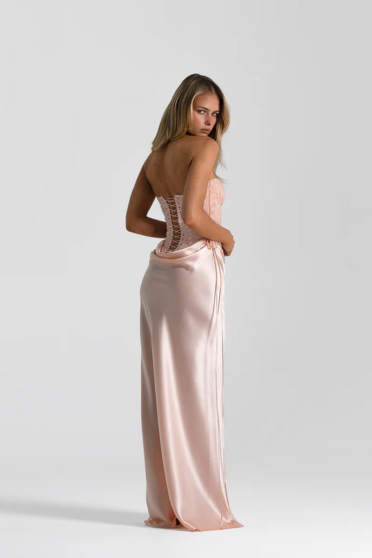 Back, side view of Natalie Rolt Verity Bustier and Evelyn Skirt Full Set Hire in Blossom (Baby Pink).