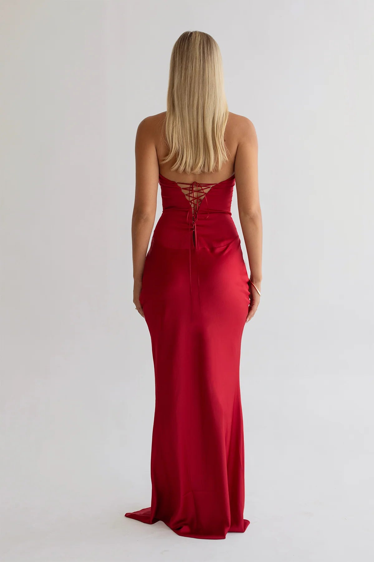 Back of HNTR (Hunter) the Label Ashton Gown in shade Wine. A beautiful, deep-red maxi with a faux-corset & adjustable back. Australia-Wide Dress Hire. Rent now!