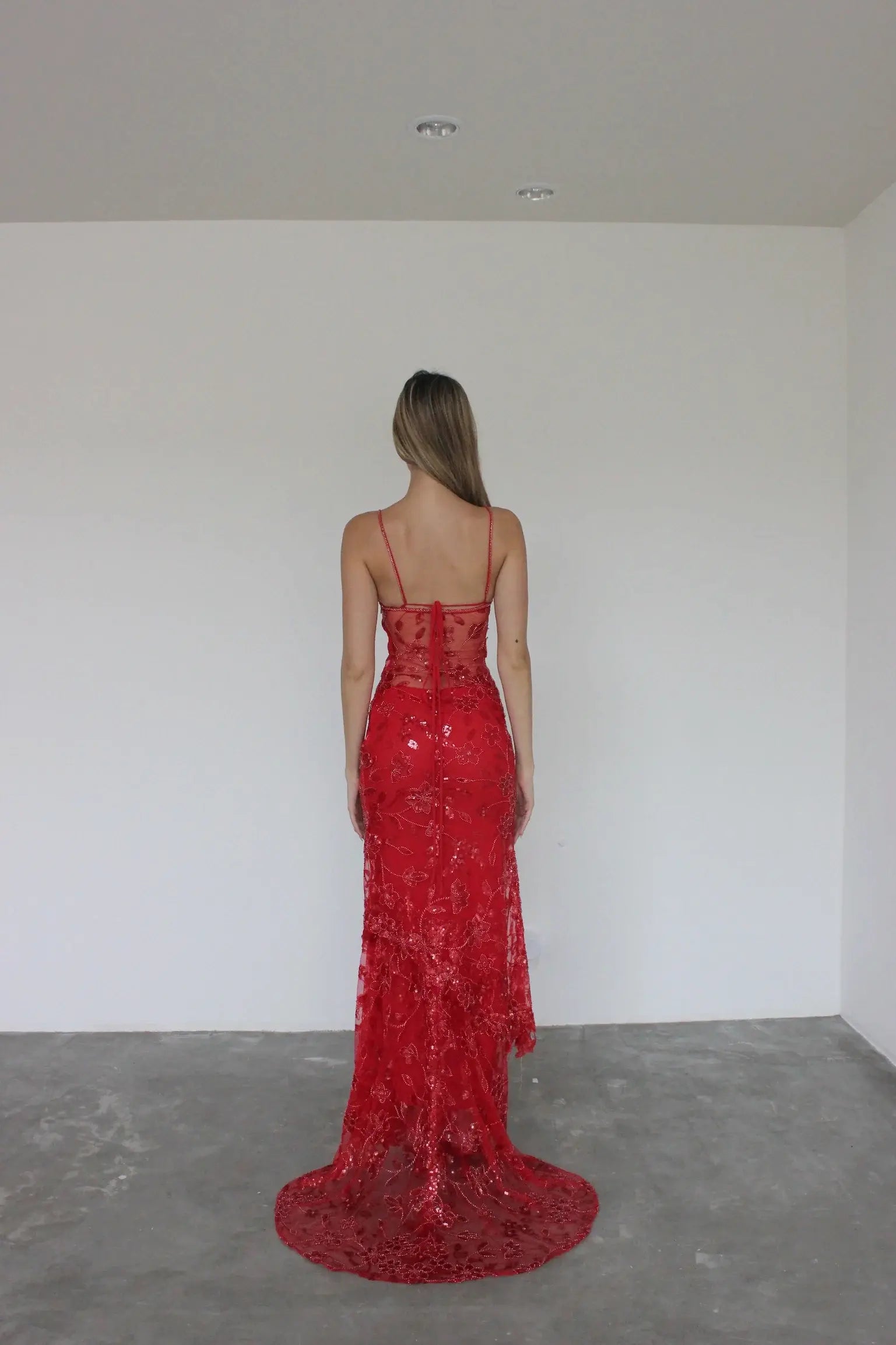 Back of the Cha Collective Delilah Maxi in Red showing beaded, sheer train. Perfect for your formal or ball event! Rent now, Australia wide!